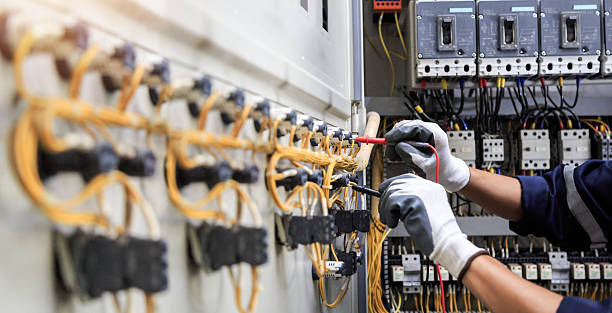 Professional Electrician technician working in Camden, AL